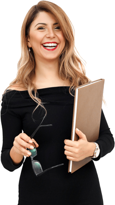 smiling woman holding a book and glasses